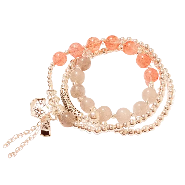 Vòng tay đá thạch anh dâu phối charm bạc rơi