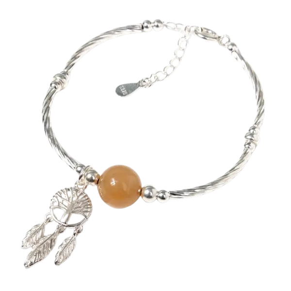 Vòng tay đá thạch anh vàng phối chuông gió mix bạc